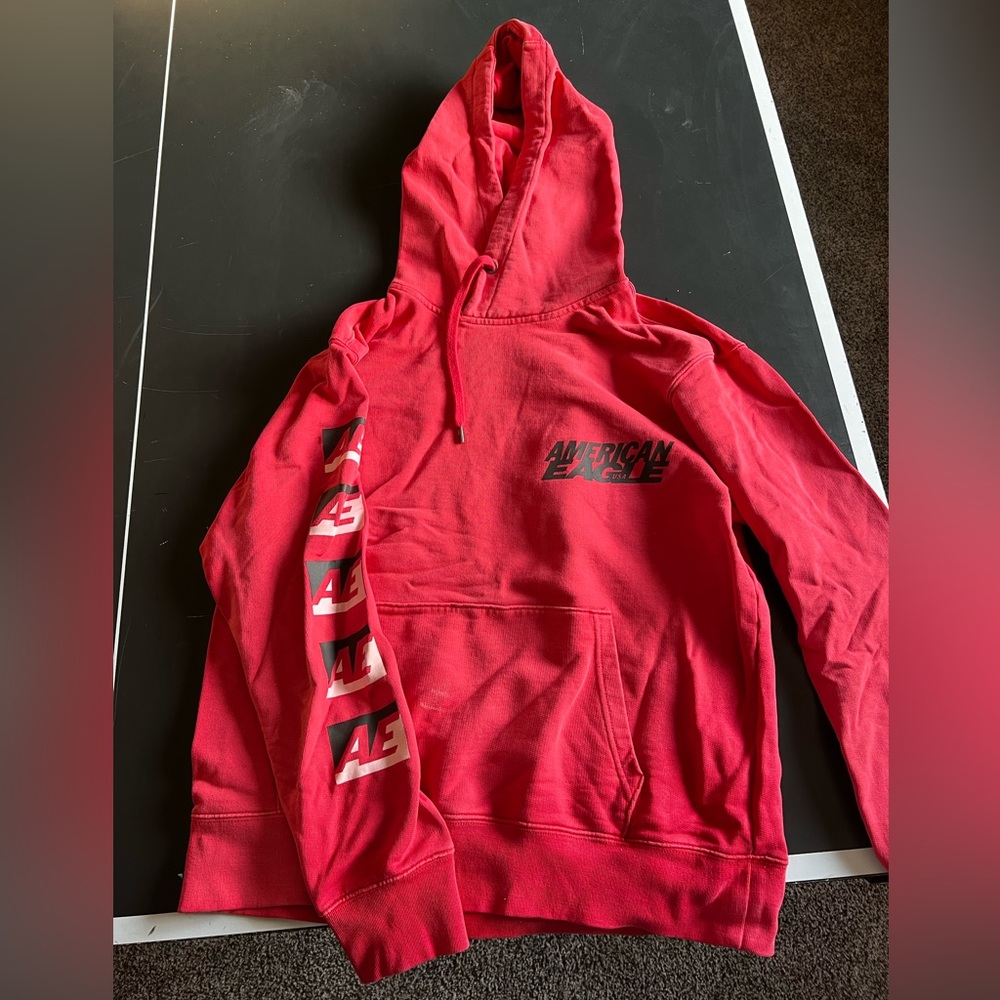 American Eagle Mens red sweatshirt, size medium.